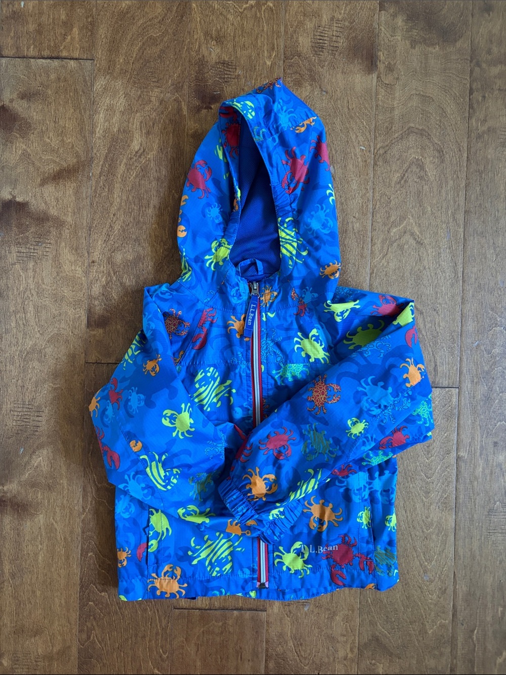 L.L. Bean Kids' Bright Blue Hooded raincoat with Colorful Crab Print